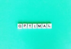 Spelling of optimal on a turquoise background