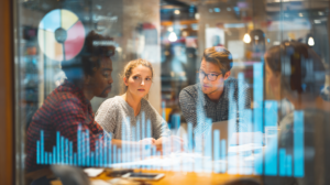 People in an office studying analytics